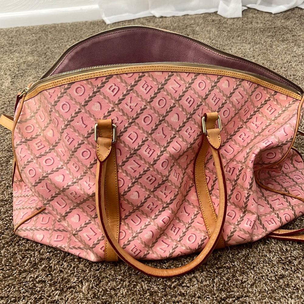 pink doiney and bourke weekend suitcase bag.